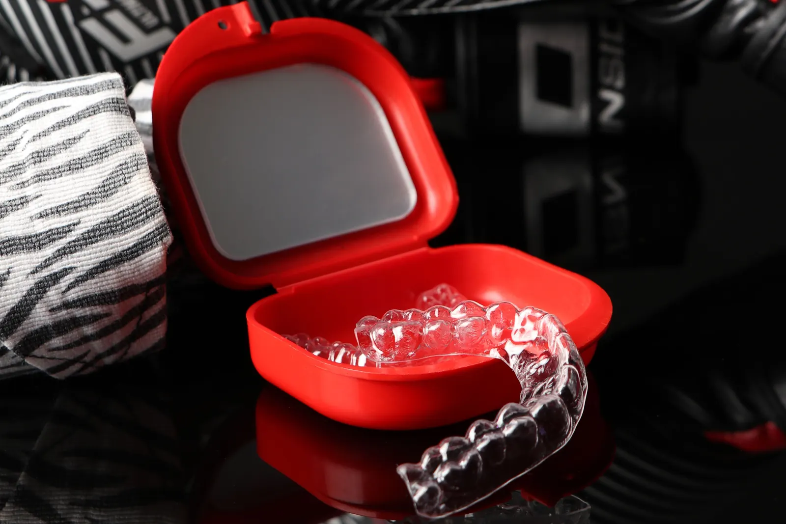 Clear aligner trays in an open case
